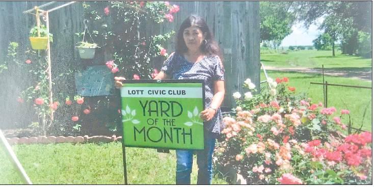 The Lott Queen of the Prairie Civic Club chose Susan Evans as the winner of the Spring Yard of the Month.