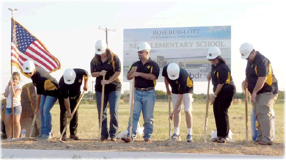 Liz Kennedy | The Rosebud News            The RLISD School Board was present to break ground on the new site for the school building, standing in what is to be the area of the front door.