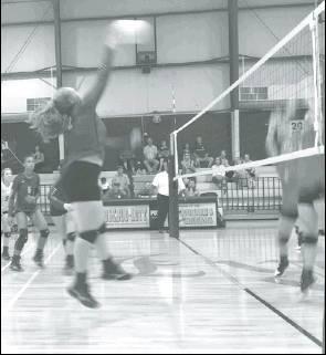 Liz Kennedy | The Rosebud News            Lady Cougar in action against the Bremond Lady Tigers last Tuesday waiting to set the ball back to her teammate for the point.