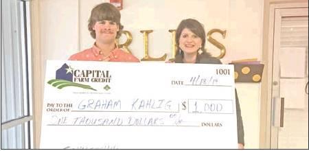 Rosebud-Lott High School Senior Graham Kahlig was awarded a $1,000 scholarship from Capital Farm Credit’s Temple branch office. Pictured are Kahlig (left) and Bethany Rosebrock, Capital Farm Credit Vice President Relationship Manager.