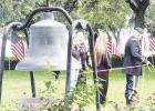 Attendees at the Memorial Day ceremony gathered at the southeast corner of the Falls County Courthouse grounds for the ringing of the historic bell. Photo by Mark Pelzel