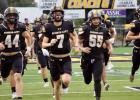 Rosebud-Lott Cougars Bo McGinniss (44), Pryce Rabroker (7), Logan Tays (55), and Cody Avant (12), lead the team onto the field during their home game against the Thrall Tigers last Friday night. The Cougars were victorious, beating the Tigers by the score