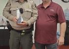 , Reisel Police Chief Danny Krumnow with Falls County Sherrif Ricky Scaman honoring Sheriff’s Deputy Matt Jones.