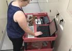 Rachel Short, Ph.D., takes measurements of a mammal fossil in the Biodiversity Research and Teaching Collections at Texas A&M University. (Texas A&M photo)